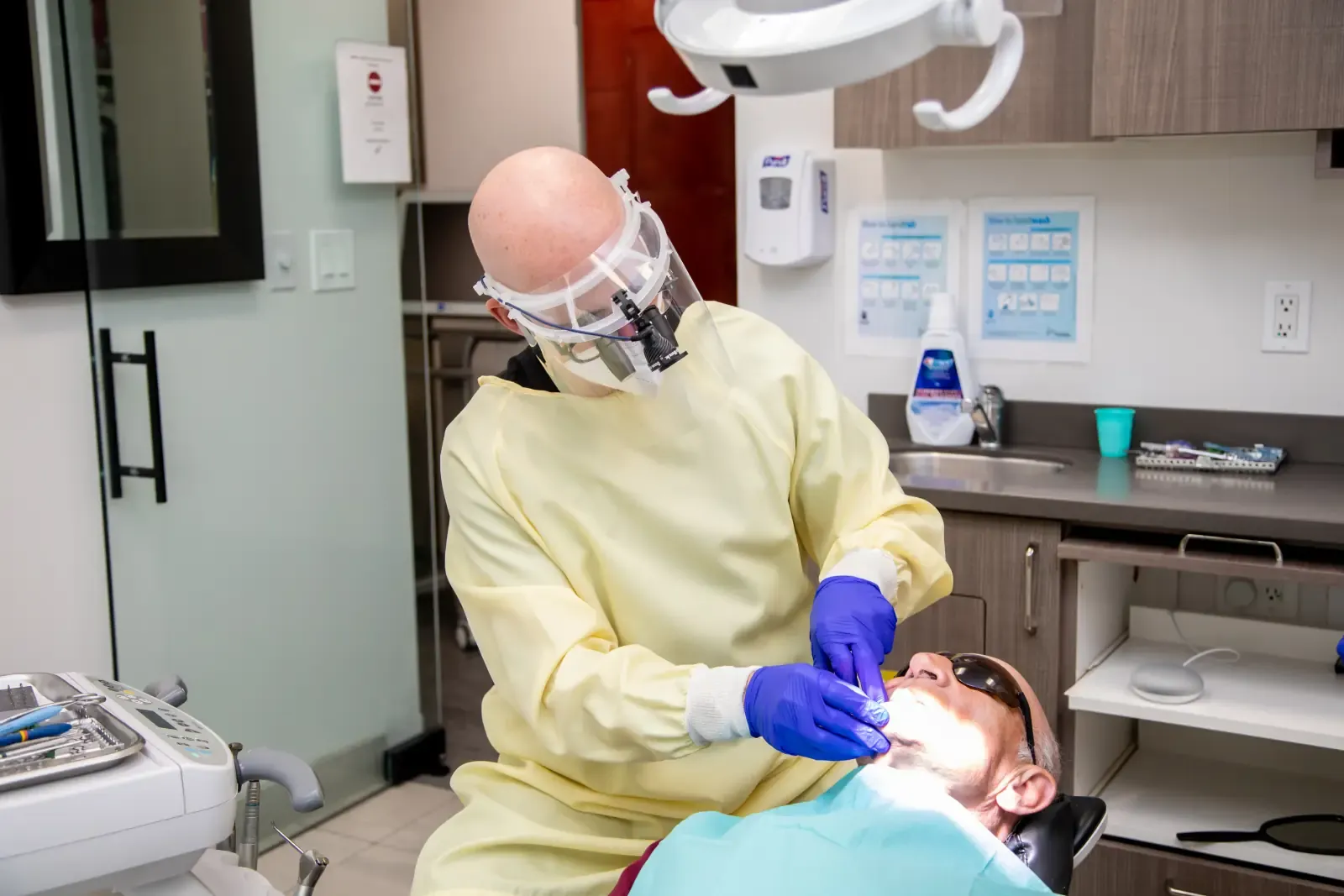 Dr. Noah Belman providing dental care in a Belman Dental Centre treatment room